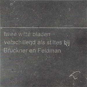 Tegel met haiku van Jan Loman.